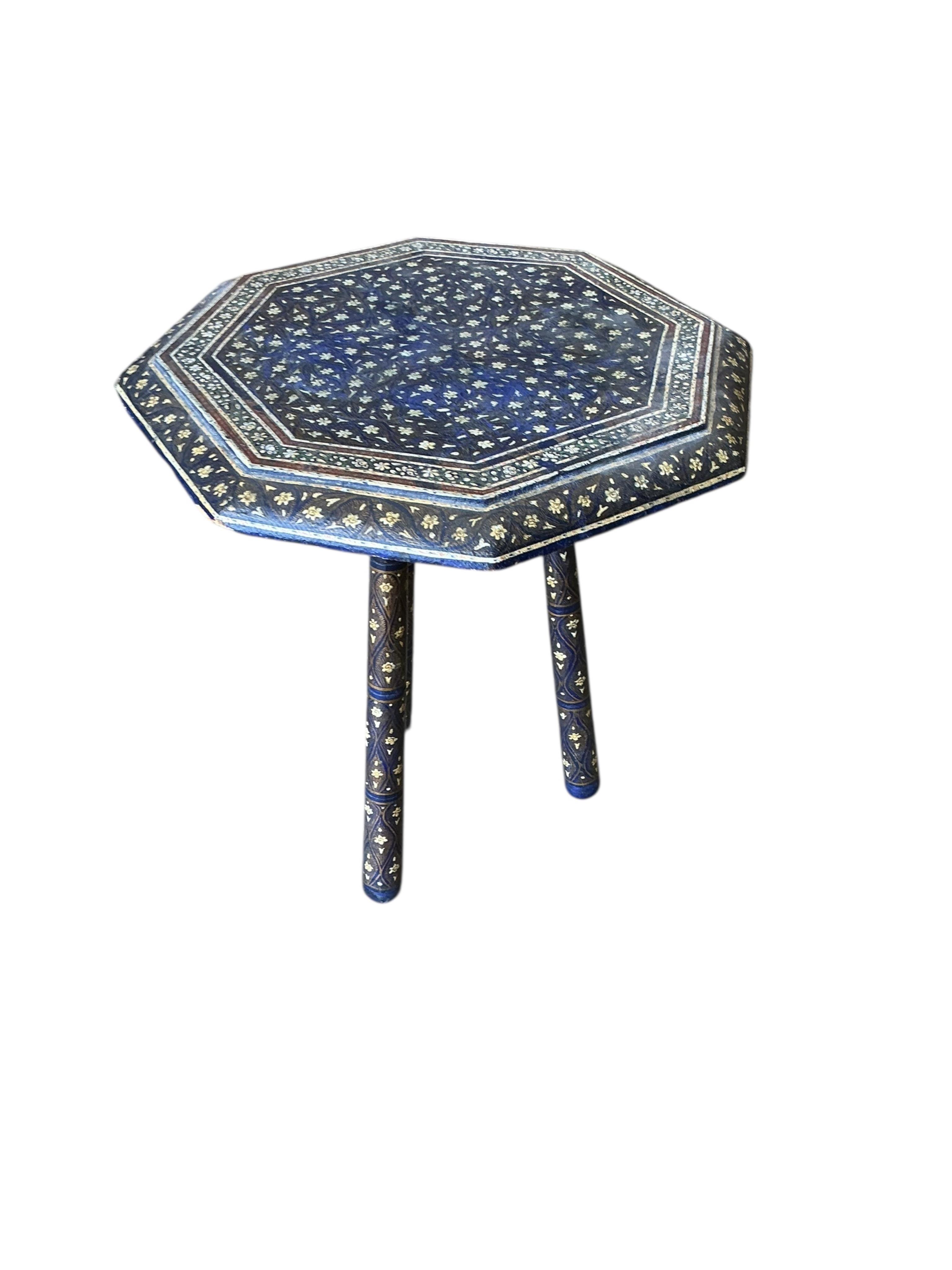 A small Damascan painted octagonal occasional table, width 30cm, height 34cm